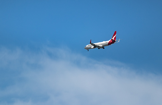 Brisbane, Australia - February 19, 2020: A Boeing 737 of Qantas Airlines in flight aproaching for landing in Brisbane.