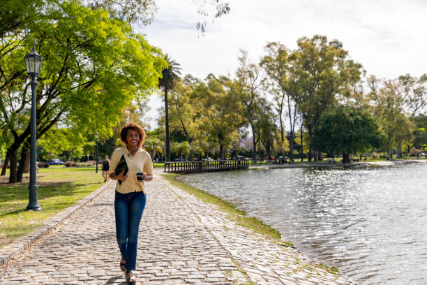 istock Woman in a public park 1219412320