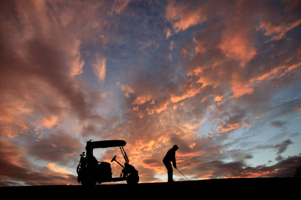 istock Silhouette of Golfer at Sunset 1219413575