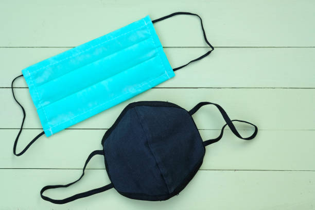 istock Green and black homemade face mask. 1219413724