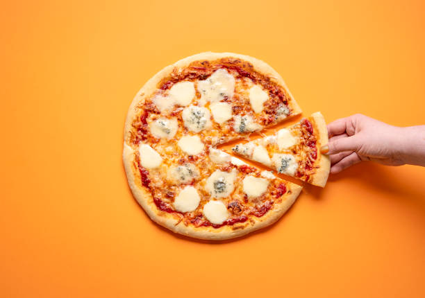 Grabbing cheese pizza slice. Taking one slice of pizza