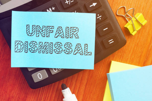 istock Conceptual hand written text showing unfair dismissal 1219416606