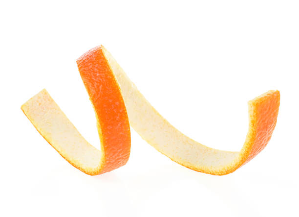 istock Curly orange peel isolated on a white background, front view. Orange zest spiral. Vitamin C. 1219417468