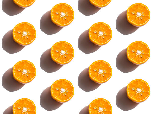 istock seamless pattern of tangerine slices on a white background 1219419274