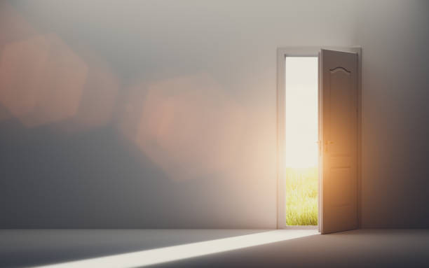 istock Door open to new better world, positive optimistic future 1219421895