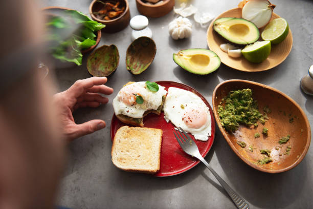istock Making Healthy green veggie avocado sandwich 1219427483