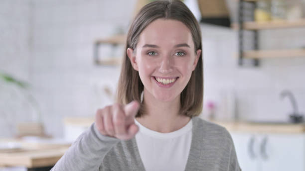istock Young Woman Pointing Finger at Camera 1219428208