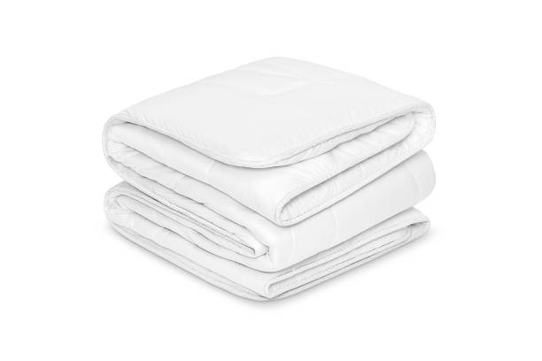 istock Folded soft white blanket, bedspread or duvet for a comfortable sleep. White blanket folded on a white background. Fabric structure. 3D blanket model. Comfortable sleep. Close up photo 1219431348