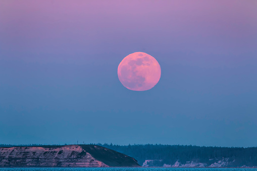 Pink supermoon rising over Protection Island