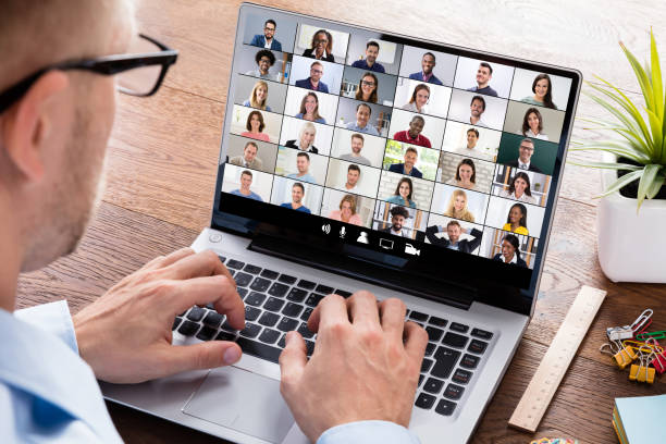 istock Businessperson Videoconferencing On Laptop 1219438066