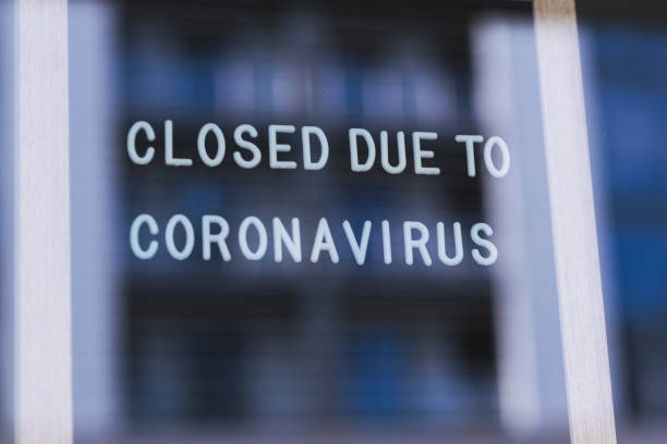 istock Closed due to coronavirus text on blackboard 1219439179