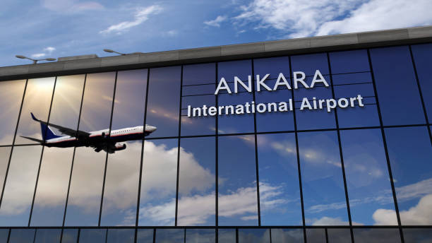 istock Airplane landing at Ankara mirrored in terminal 1219439549