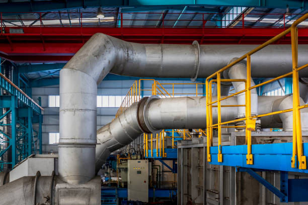 istock Industrial building  with ventilation system pipes 1219442253