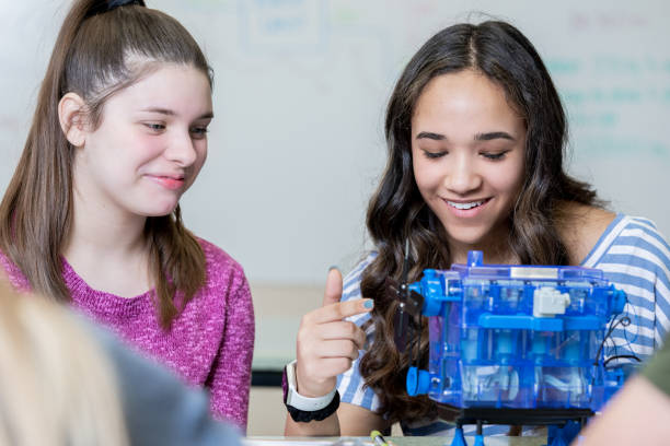 istock Two female students in high school working on STEM project 1219442358