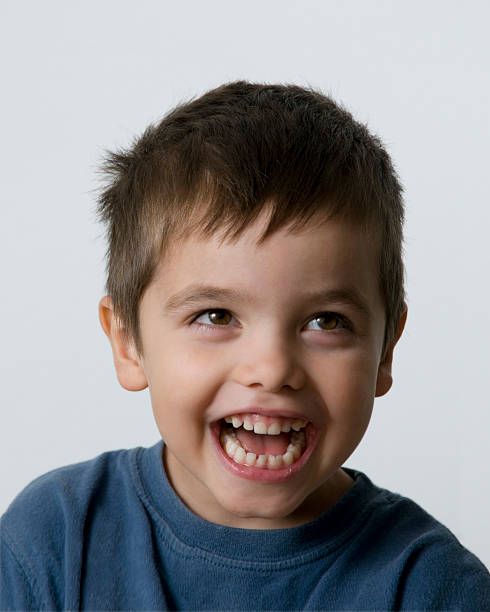 istock laughing child looks up 121944312