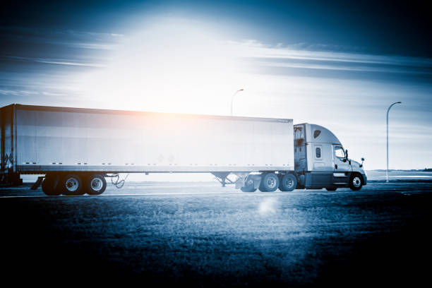 Semi Truck On the  Rural Trans-Canada Highway at sunset.