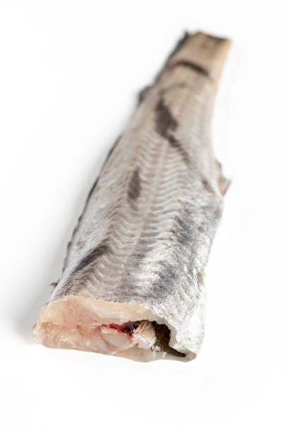 istock Fresh raw hake fish isolated over white background 1219446290