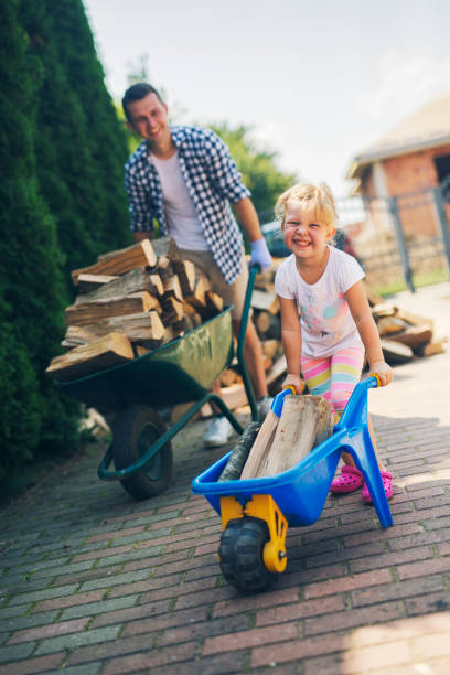 istock Lumberjack and a little girl 1219450089