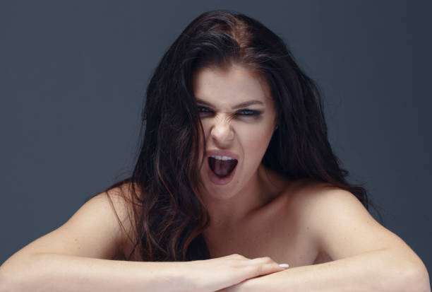istock Angry woman portrait 1219451289