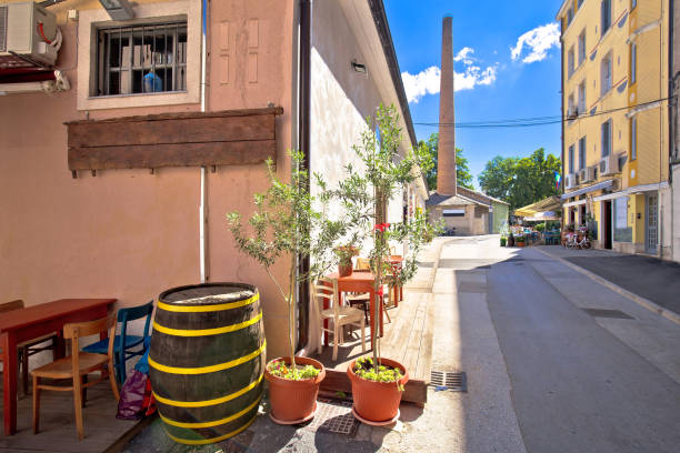 istock Pula. Sunny stone street of ancient Pula view 1219452959