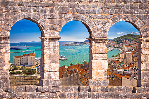 Split waterfront aerial panoramic view through stone window, Dalmatia, Croatia