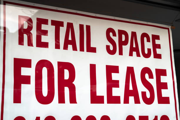 istock A red and white sign saying retail space for lease with border hangs in a vacant storefront glass window in Chicago during the COVID-19 or cornavirus outbreak and pandemic. 1219453361