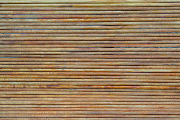 ribbed wooden background, horizontal stripes parallel, dark brown design basis natural material