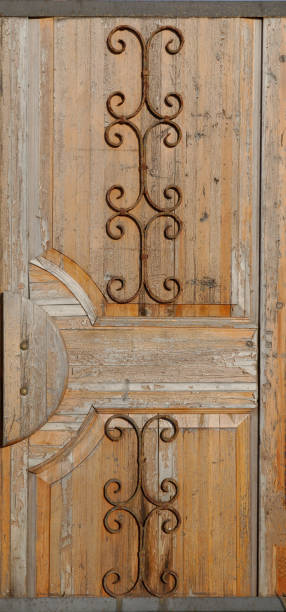 istock old vintage door with peeling paint. 1219458286