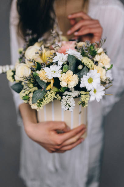 istock Woman holding a gorgeous bouquet 1219461851