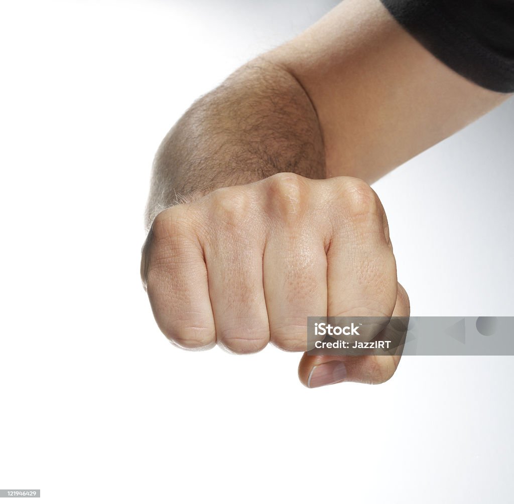 Крупным планом правой мужской руки, Поднятые вверх clenched Кулак - Стоковые фото Белый фон роялти-фри