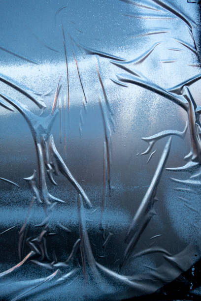 istock grunge winked bumpy ripped glued silver blue painted paper on a wall background textured backdrop asset 1219469263