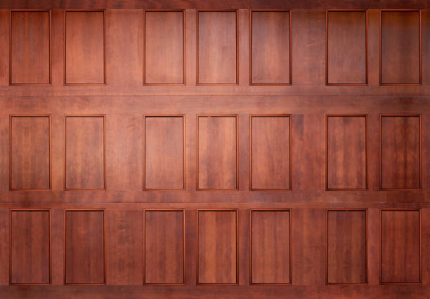 istock sealed deep brown stained wood garage car door 1219469273