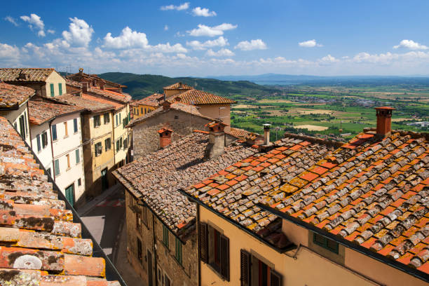 Rooftop view of picturesque Cortona Rooftop view of picturesque Cortona, a hilltop town in Tuscany, Italy cortona stock pictures, royalty-free photos & images