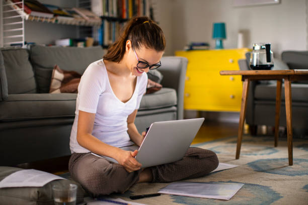 istock Young woman working from home 1219477461