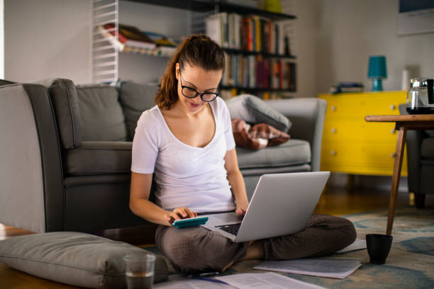 istock Young woman working from home 1219478132