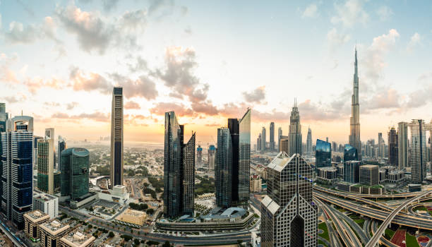 istock Panoramic View of Dubai Skyline at Sunrise 1219478220
