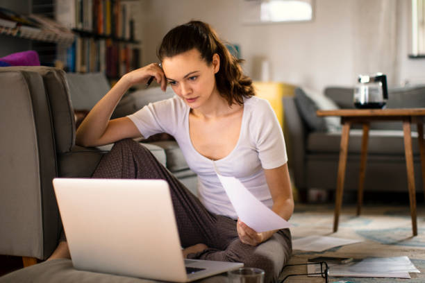 istock Young woman working from home 1219480742