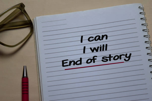 istock I can. I will. End of story write on a book isolated on Office Desk 1219480829