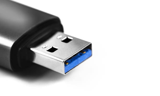 istock USB 3.0 connector on a white background closeup, macro 1219488579