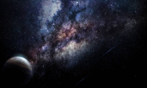 istock abstract space illustration, 3d image, planet in space in the radiance of stars, eclipse 1219490310