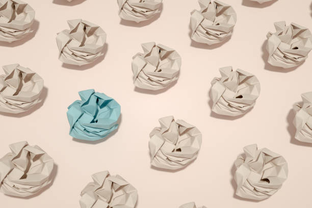 istock Crumpled Paper, Different Idea, Standing Out From the Crowd Concept 1219491176