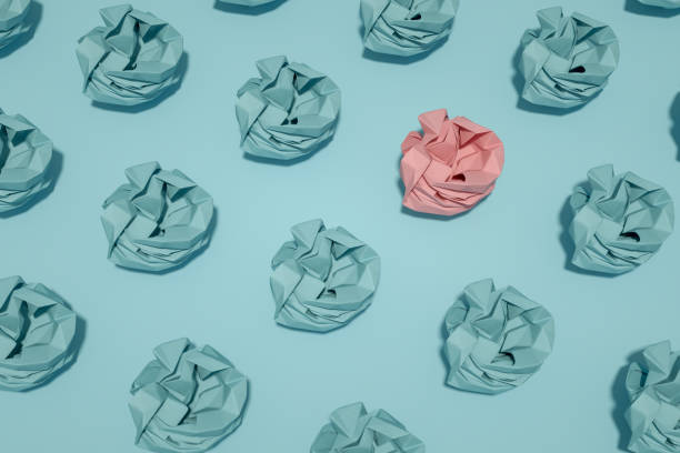 istock Crumpled Paper, Different Idea, Standing Out From the Crowd Concept 1219491197
