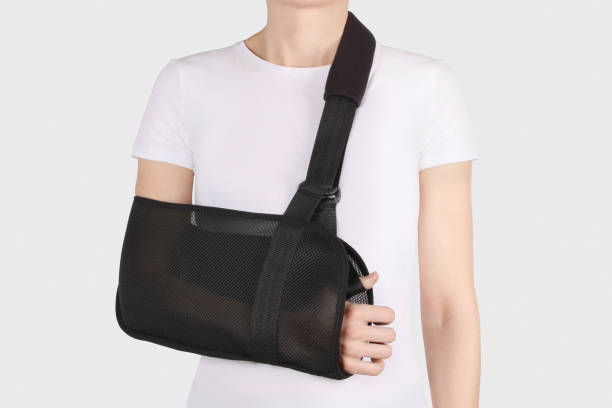 istock Shoulder Joint Brace. Bandage on the shoulder joint (scarf) with additional fixation. Deso's Handwrap. Supports & Immobilizers. Orthopedic medical Braces. Shoulder injury. 1219492272