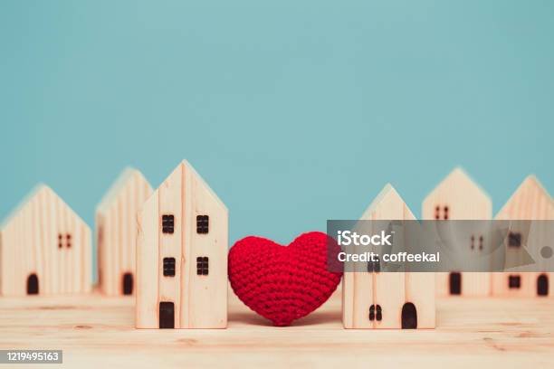 Love Heart Between Two House Wood Model For Stay At Home For Healthy Community Together Concept Stock Photo - Download Image Now