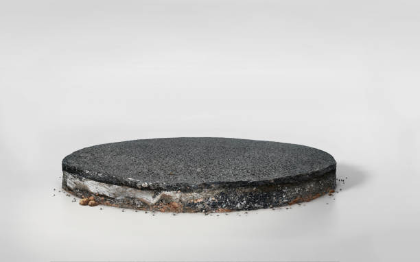 istock 3D asphalt road on round layered soil cross section isolated on blue sky 1219495777