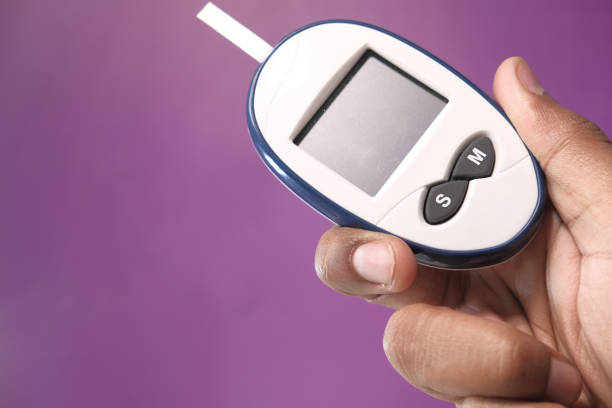 istock blood sugar measurement for diabetes on hand 1219497173