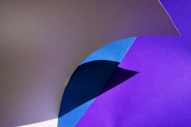 istock Multicolored curved paper background.Artistic creative backdrop photography. 1219498997