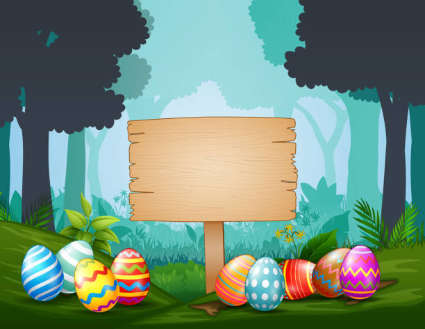 istock Easter eggs with wooden sign  in the middle of dark forest 1219499919