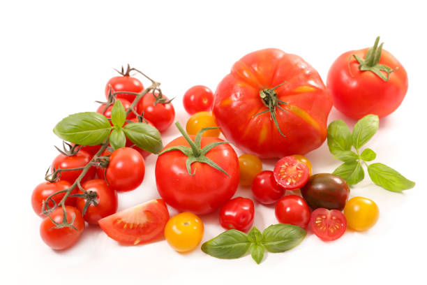 istock collection of colorful tomatoes and basil 1219501026