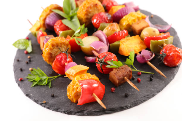 istock vegetable grilled barbecue with cob corn, tomato,bell pepper,onion 1219501034